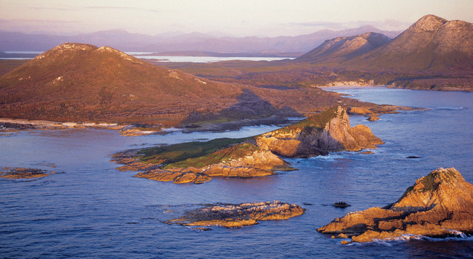 Southwest National Park, Tasmanias South - landscape sunrise/sunset coastal rocky coastline mountains lake